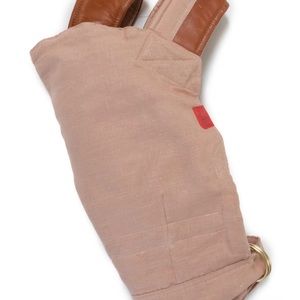 Sakura Bloom Scout linen baby carrier in “Salt” with Whiskey Leather.